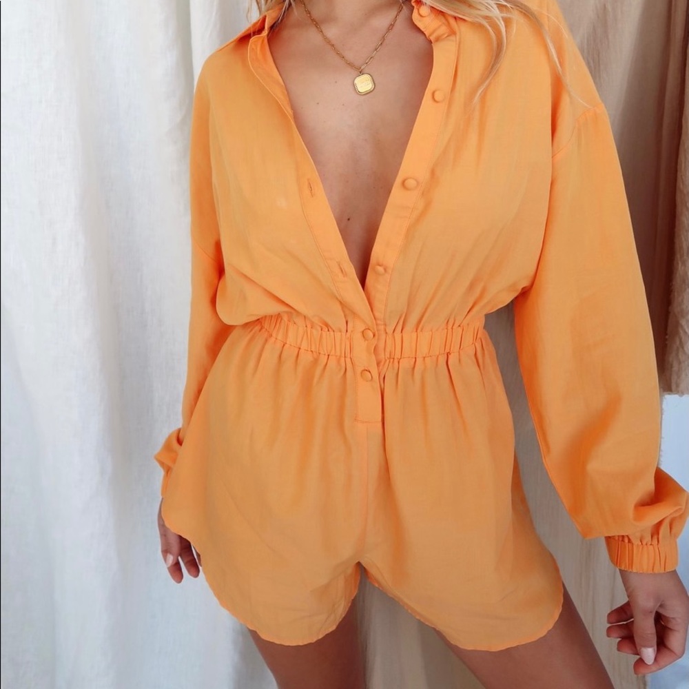 12th tribe slow burn orange romper